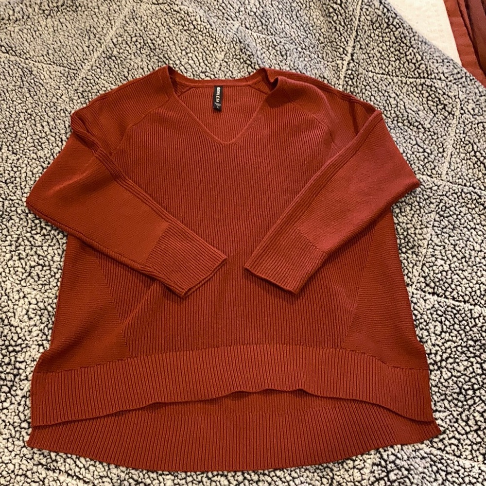 Burnt red Athleta sweater size large.